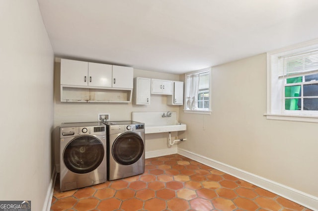 26 Clarendon Ave, Avondale Estates, GA 30002 - clothes washing area with baseboards and washing machine and dryer