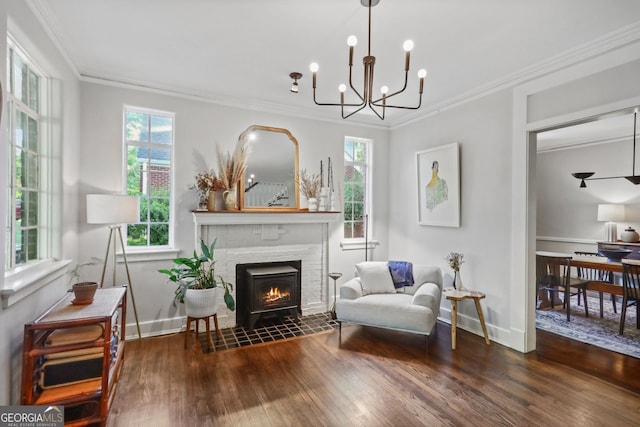26 Clarendon Ave, Avondale Estates, GA 30002 - sitting room featuring wood-type flooring, baseboards, a chandelier, and ornamental molding