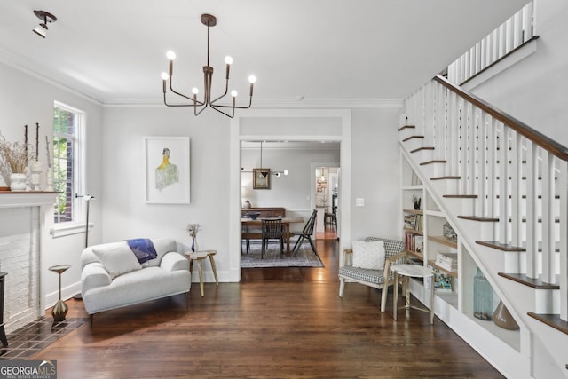 26 Clarendon Ave, Avondale Estates, GA 30002 - interior space featuring crown molding, wood finished floors, stairway, baseboards, and an inviting chandelier