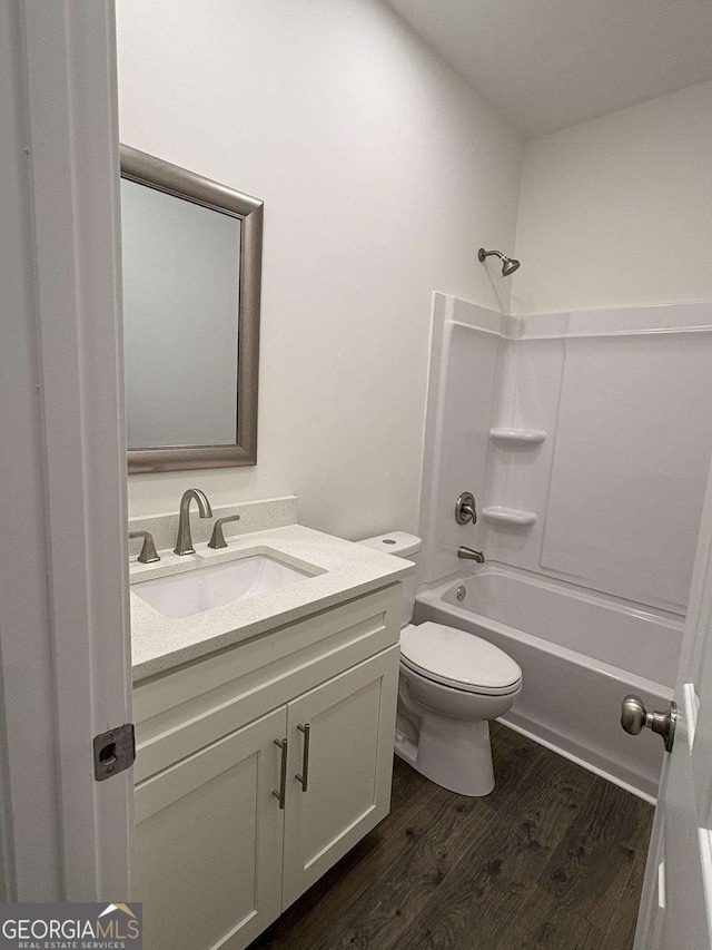 569 Tinker Bell Cir, Flintstone, GA 30725 - full bathroom with shower / bath combination, vanity, toilet, and wood finished floors