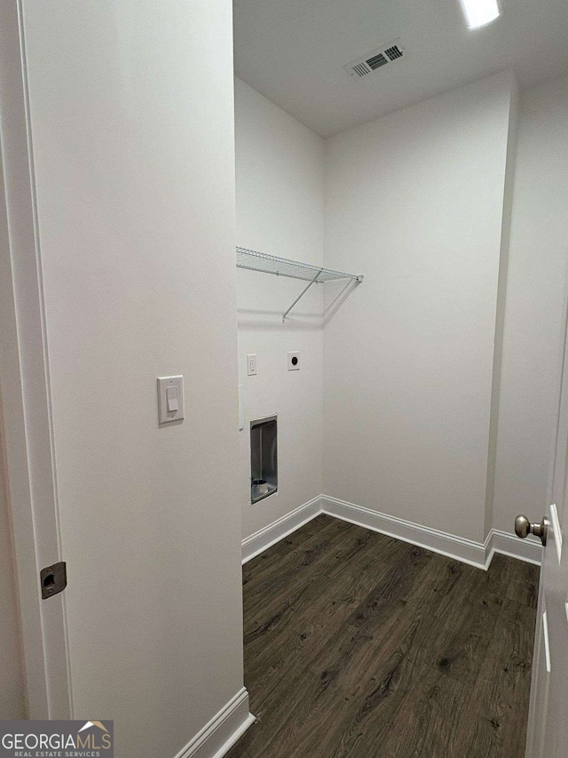 569 Tinker Bell Cir, Flintstone, GA 30725 - washroom featuring hookup for an electric dryer, laundry area, visible vents, dark wood finished floors, and baseboards
