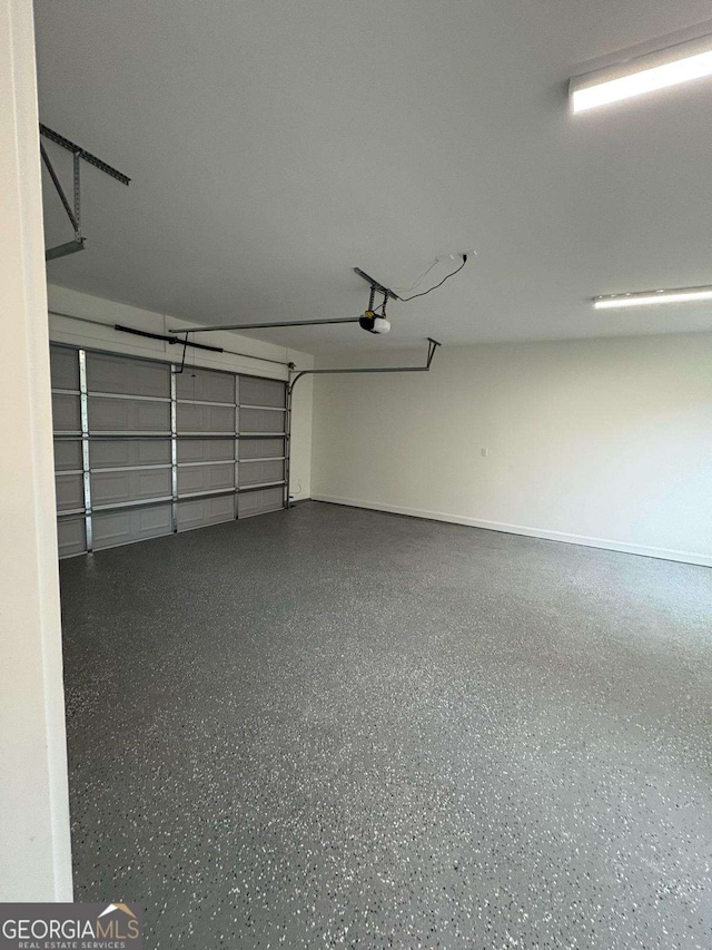 569 Tinker Bell Cir, Flintstone, GA 30725 - garage featuring a garage door opener