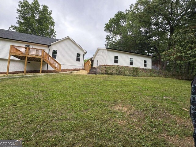 569 Tinker Bell Cir, Flintstone, GA 30725 - rear view of property featuring a deck, a yard, and stairway