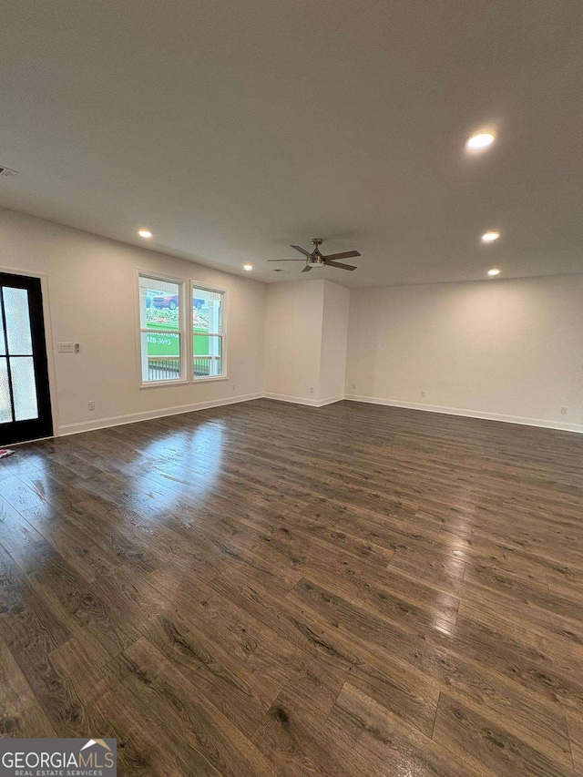 569 Tinker Bell Cir, Flintstone, GA 30725 - unfurnished room featuring a healthy amount of sunlight, recessed lighting, and dark wood-style flooring