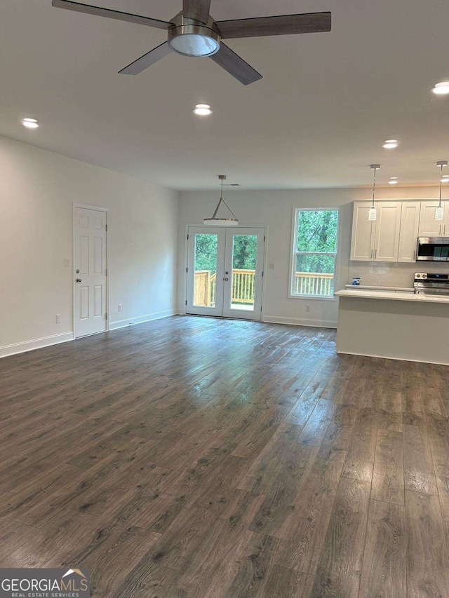 569 Tinker Bell Cir, Flintstone, GA 30725 - unfurnished living room with recessed lighting, a ceiling fan, dark wood-type flooring, and french doors