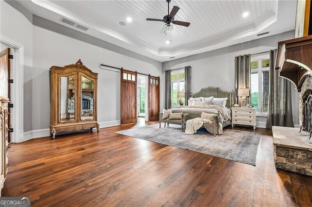 1101 N Flat Rock Rd, Douglasville, GA 30134 - bedroom with visible vents, hardwood / wood-style flooring, wooden ceiling, ornamental molding, and a tray ceiling