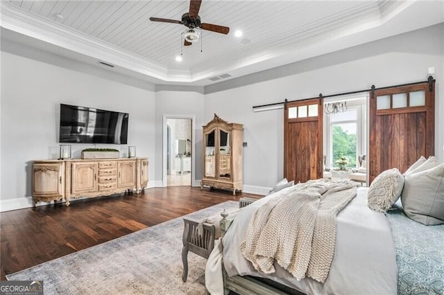 1101 N Flat Rock Rd, Douglasville, GA 30134 - bedroom featuring crown molding, visible vents, baseboards, dark wood-type flooring, and a tray ceiling