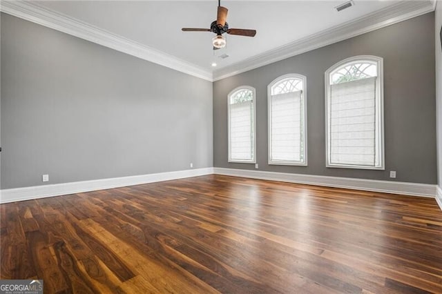 1101 N Flat Rock Rd, Douglasville, GA 30134 - spare room with crown molding, ceiling fan, visible vents, and wood finished floors