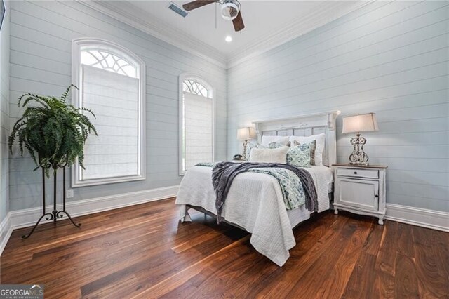 1101 N Flat Rock Rd, Douglasville, GA 30134 - bedroom featuring crown molding, baseboards, dark wood-style floors, and visible vents