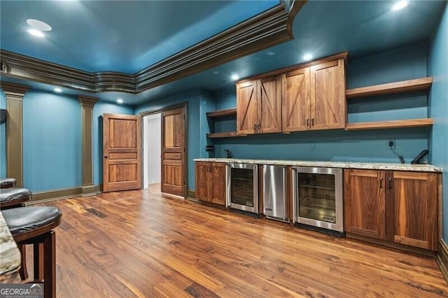 1101 N Flat Rock Rd, Douglasville, GA 30134 - bar featuring indoor wet bar, fridge, beverage cooler, and wood finished floors