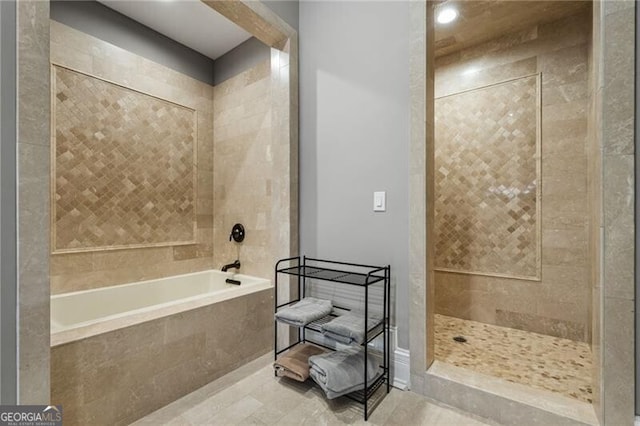 1101 N Flat Rock Rd, Douglasville, GA 30134 - bathroom with recessed lighting, tiled bath, and tiled shower