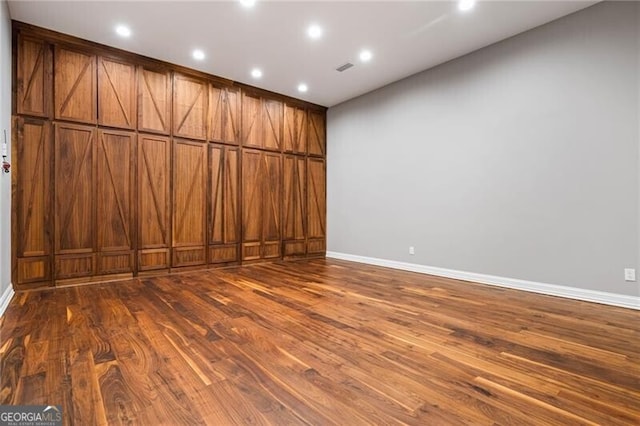 1101 N Flat Rock Rd, Douglasville, GA 30134 - unfurnished room with baseboards, recessed lighting, and dark wood-style floors