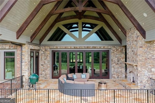 1101 N Flat Rock Rd, Douglasville, GA 30134 - entrance to property featuring french doors, an outdoor living space, a patio area, and stone siding