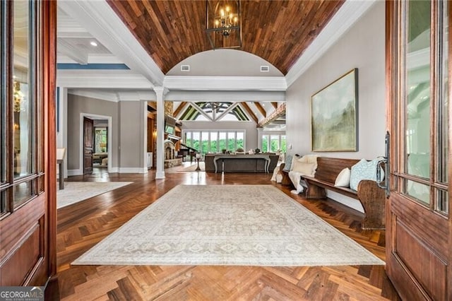 1101 N Flat Rock Rd, Douglasville, GA 30134 - interior space featuring crown molding, baseboards, ornate columns, a notable chandelier, and vaulted ceiling