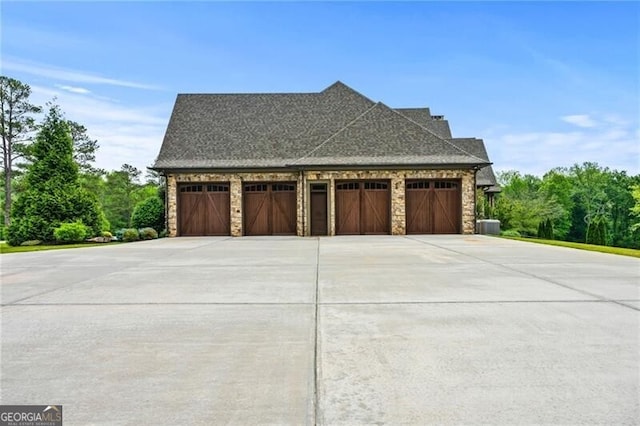1101 N Flat Rock Rd, Douglasville, GA 30134 - garage featuring driveway