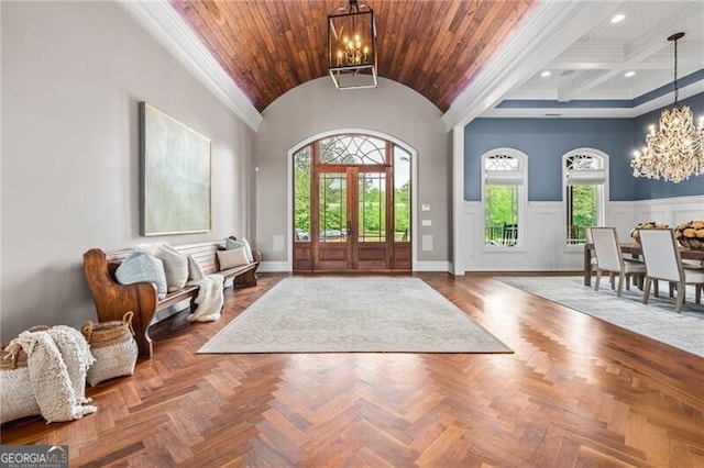1101 N Flat Rock Rd, Douglasville, GA 30134 - foyer featuring a wainscoted wall, a wealth of natural light, lofted ceiling, and a chandelier