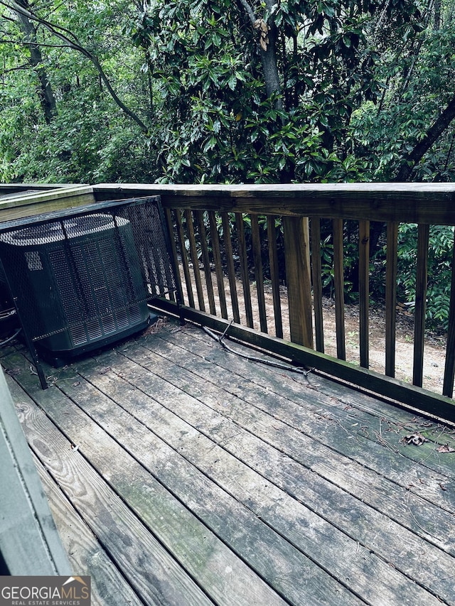 107 Highwood Ln, East Point, GA 30344 - wooden terrace featuring central air condition unit