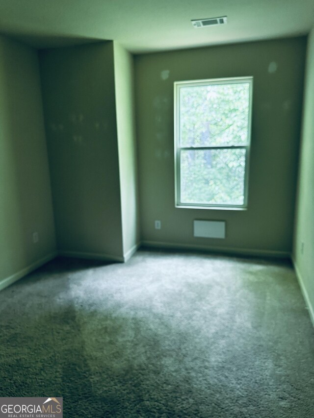 107 Highwood Ln, East Point, GA 30344 - unfurnished room featuring carpet flooring, baseboards, and visible vents