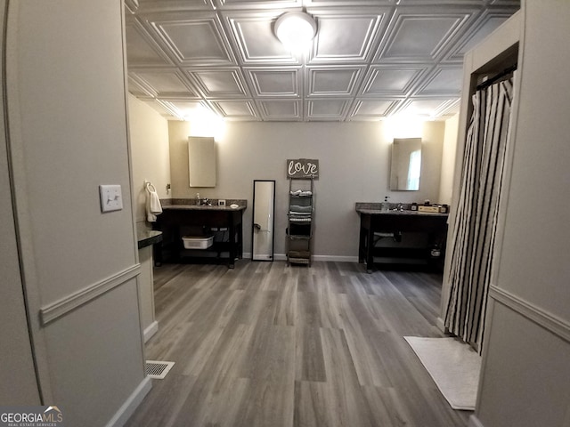 328 Kelly Creek Rd, Waco, GA 30182 - hall featuring an ornate ceiling, wood finished floors, baseboards, and a sink