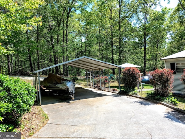 328 Kelly Creek Rd, Waco, GA 30182 - view of parking / parking lot with driveway and a detached carport