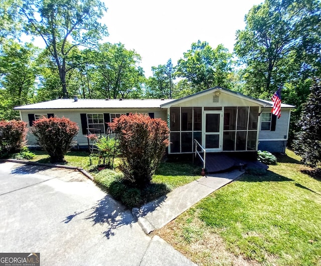 328 Kelly Creek Rd, Waco, GA 30182 - view of front of home featuring a sunroom and a front yard