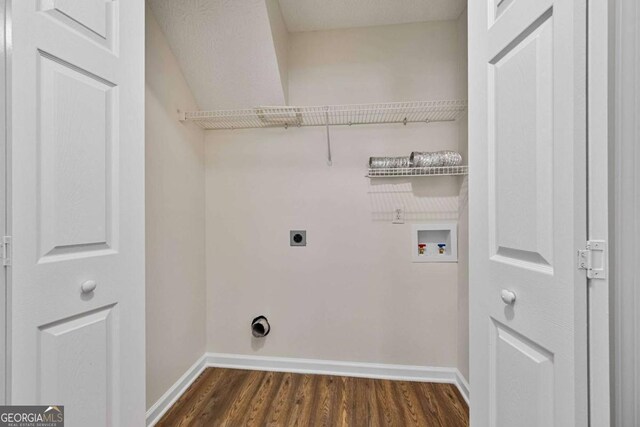 5135 Gable Ridge Way, Sugar Hill, GA 30518 - washroom featuring laundry area, washer hookup, baseboards, electric dryer hookup, and dark wood-style floors