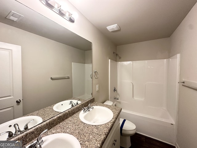 51 Donegal Ct, Dallas, GA 30132 - bathroom featuring a sink, toilet, double vanity, and visible vents