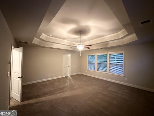 51 Donegal Ct, Dallas, GA 30132 - spare room with a ceiling fan, visible vents, a raised ceiling, baseboards, and ornamental molding