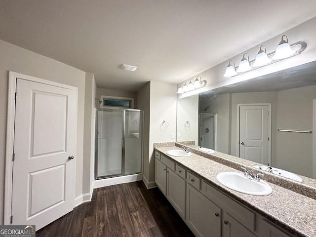 51 Donegal Ct, Dallas, GA 30132 - full bath with a sink, wood finished floors, and a shower stall