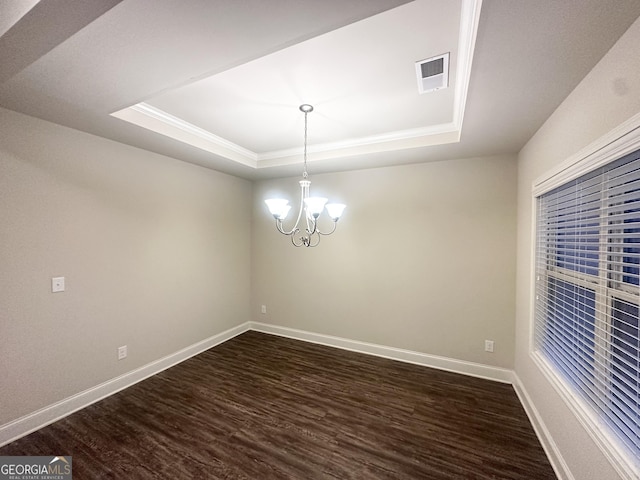 51 Donegal Ct, Dallas, GA 30132 - unfurnished dining area featuring visible vents, dark wood finished floors, baseboards, and a tray ceiling