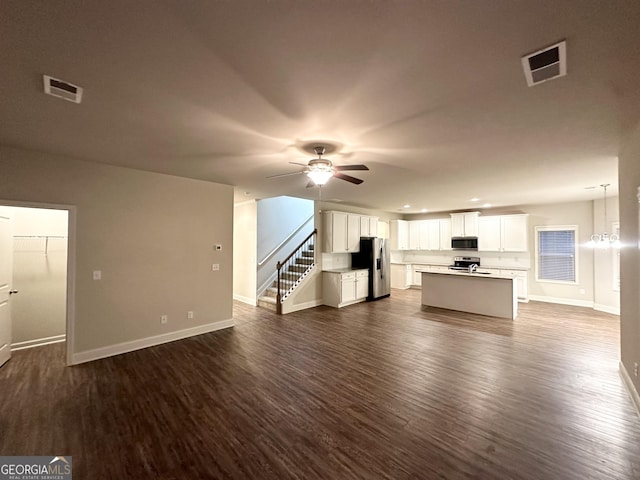 51 Donegal Ct, Dallas, GA 30132 - interior space featuring a ceiling fan, visible vents, baseboards, open floor plan, and stainless steel appliances