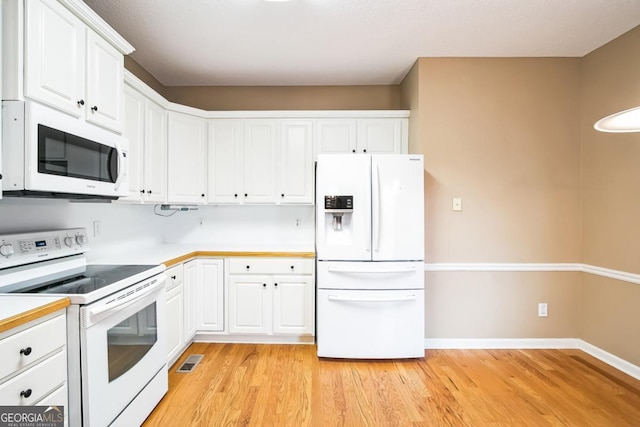 1008 Walnut Creek Dr, Woodstock, GA 30188 - kitchen featuring visible vents, white appliances, light wood-style floors, light countertops, and white cabinets