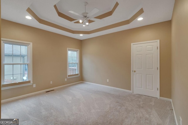 1008 Walnut Creek Dr, Woodstock, GA 30188 - carpeted spare room with crown molding, baseboards, a ceiling fan, and a raised ceiling