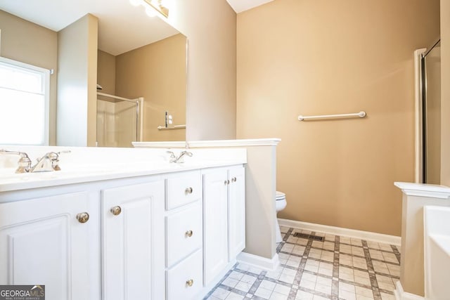 1008 Walnut Creek Dr, Woodstock, GA 30188 - bathroom with double vanity, a stall shower, baseboards, a bathing tub, and toilet