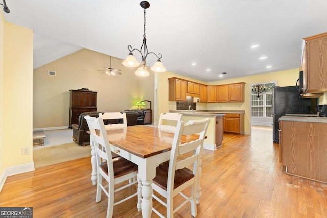 4572 Mulberry Fields Ln, Auburn, GA 30011 - dining space featuring visible vents, light wood-type flooring, baseboards, ceiling fan with notable chandelier, and recessed lighting