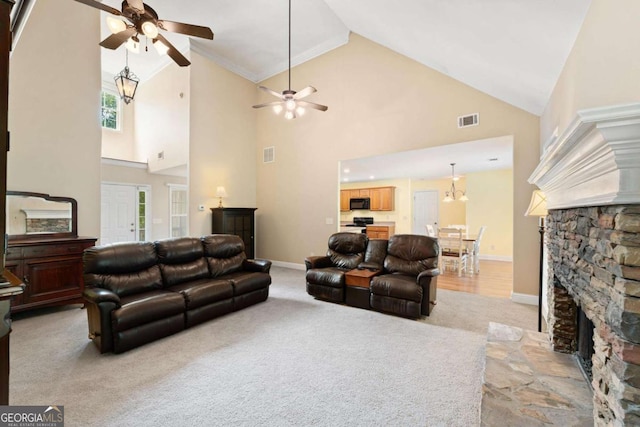 4572 Mulberry Fields Ln, Auburn, GA 30011 - living area with visible vents, ceiling fan, high vaulted ceiling, and light colored carpet
