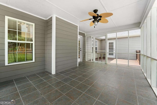 4572 Mulberry Fields Ln, Auburn, GA 30011 - unfurnished sunroom with a ceiling fan