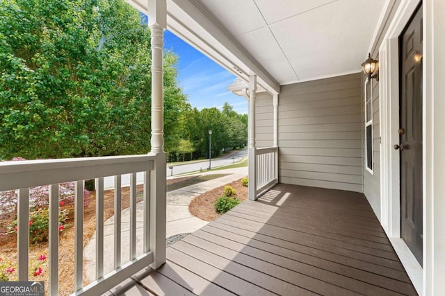 4572 Mulberry Fields Ln, Auburn, GA 30011 - wooden terrace featuring a porch