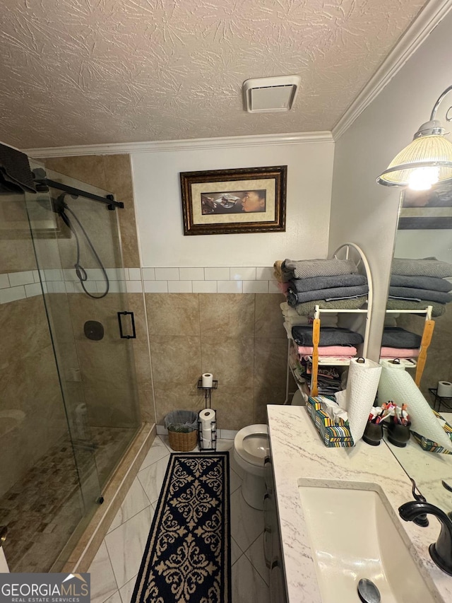 6444 Charter Way, Lithonia, GA 30058 - bathroom featuring crown molding, toilet, a textured ceiling, a sink, and a stall shower