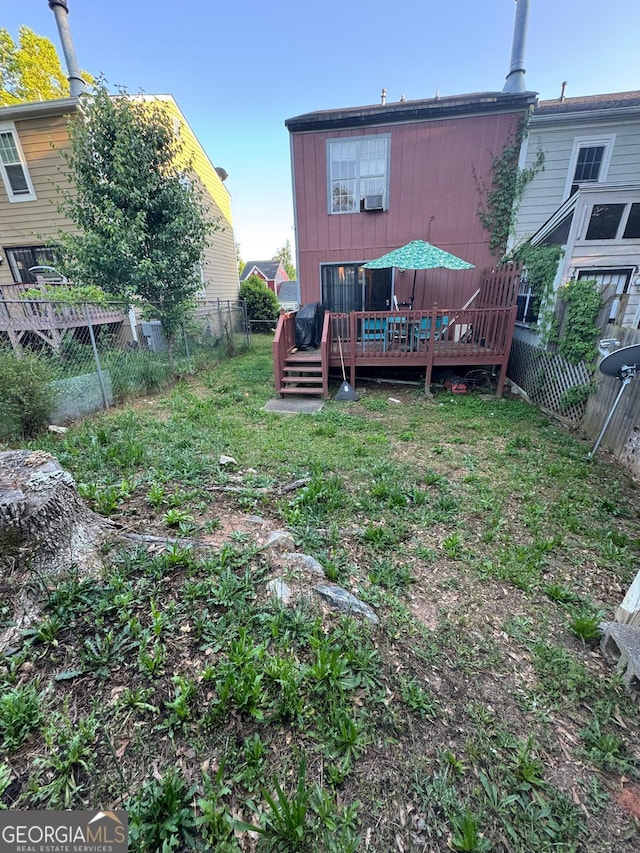 6444 Charter Way, Lithonia, GA 30058 - back of house featuring a fenced backyard and a deck