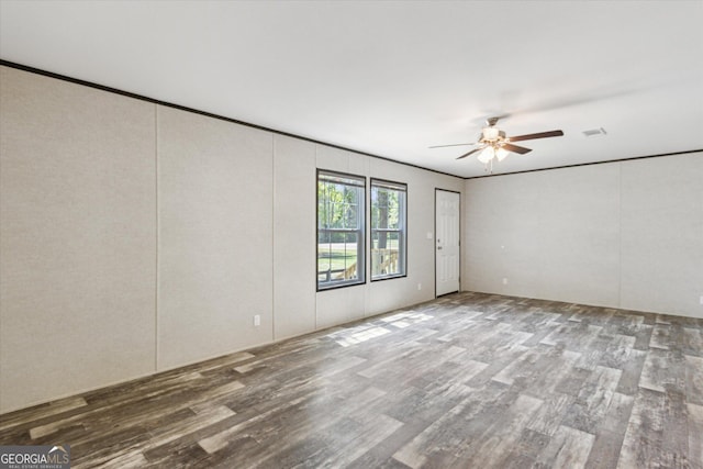 810 Simpsontown Rd, Newington, GA 30446 - spare room featuring a ceiling fan, wood finished floors, and visible vents