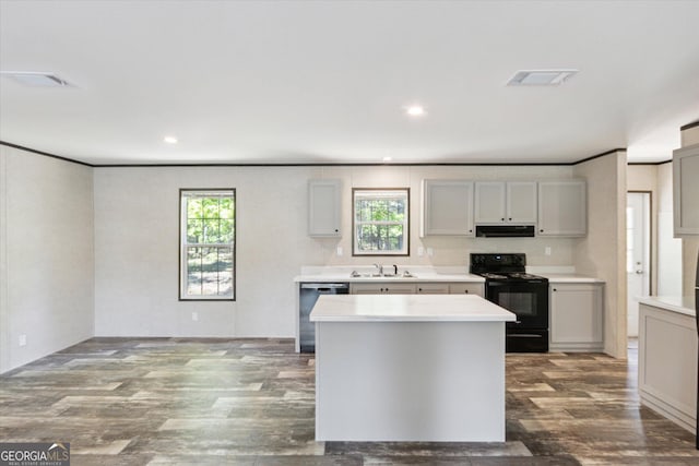 810 Simpsontown Rd, Newington, GA 30446 - kitchen featuring dishwasher, light countertops, black electric range oven, under cabinet range hood, and dark wood-style floors