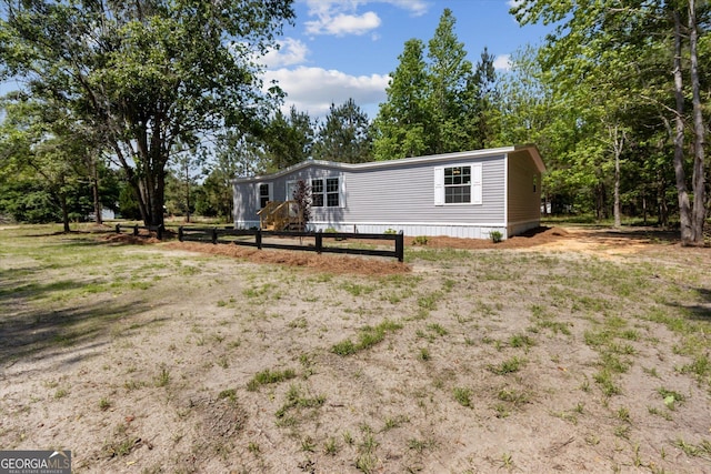 810 Simpsontown Rd, Newington, GA 30446 - manufactured / mobile home featuring fence