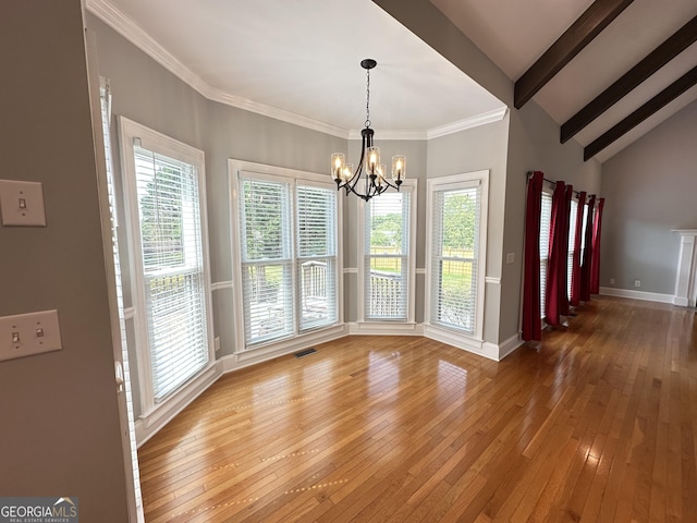 23 Saint Ives Ln, Winder, GA 30680 - unfurnished dining area with an inviting chandelier, plenty of natural light, visible vents, and light wood-style floors