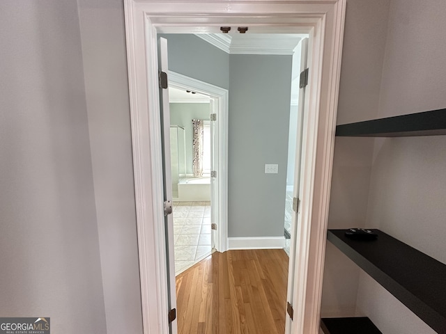 23 Saint Ives Ln, Winder, GA 30680 - hall featuring baseboards, ornamental molding, and wood finished floors