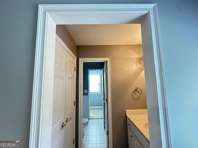 23 Saint Ives Ln, Winder, GA 30680 - bathroom with toilet, baseboards, tile patterned flooring, and vanity