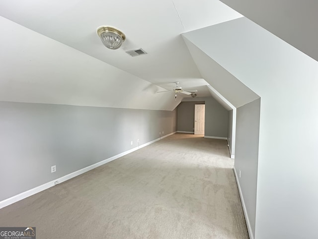 23 Saint Ives Ln, Winder, GA 30680 - additional living space with baseboards, lofted ceiling, carpet floors, and visible vents