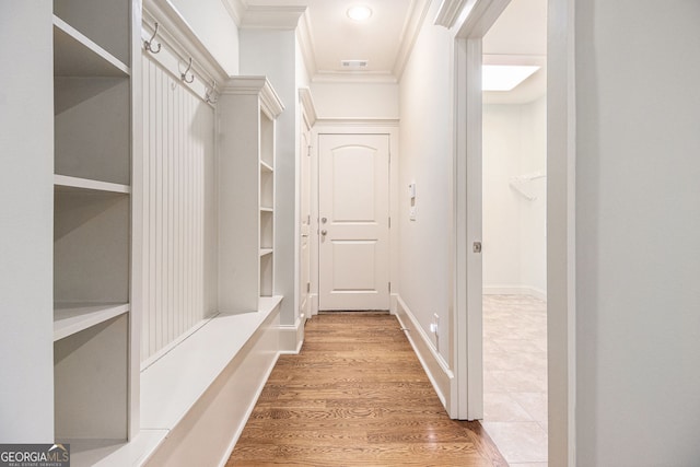 mudroom featuring visible vents, ornamental molding, light wood finished floors, and recessed lighting
