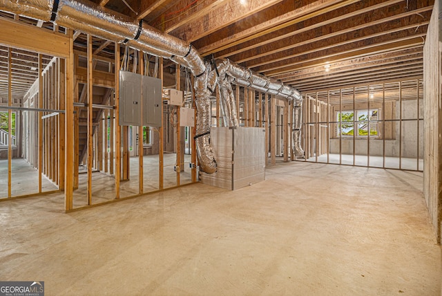 basement featuring electric panel