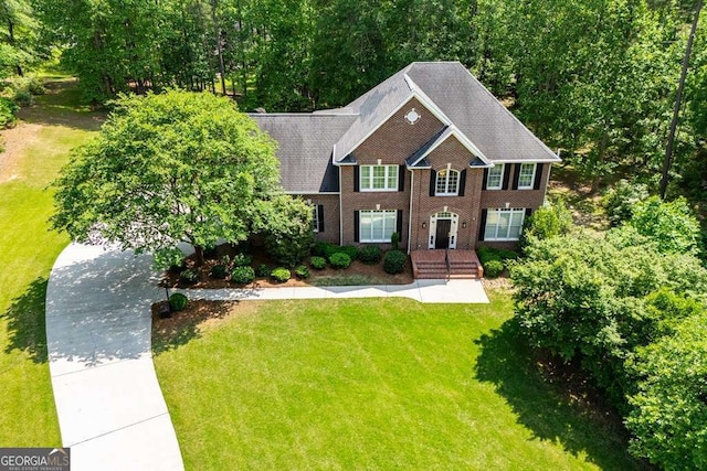 213 Shady Valley Dr, Carrollton, GA 30116 - colonial home featuring a front lawn